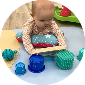 Infant exploring blocks
