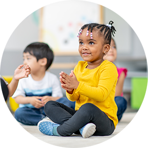 Smiling child clapping hands