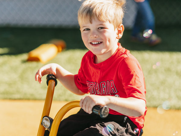 Young boy riding a bicycle